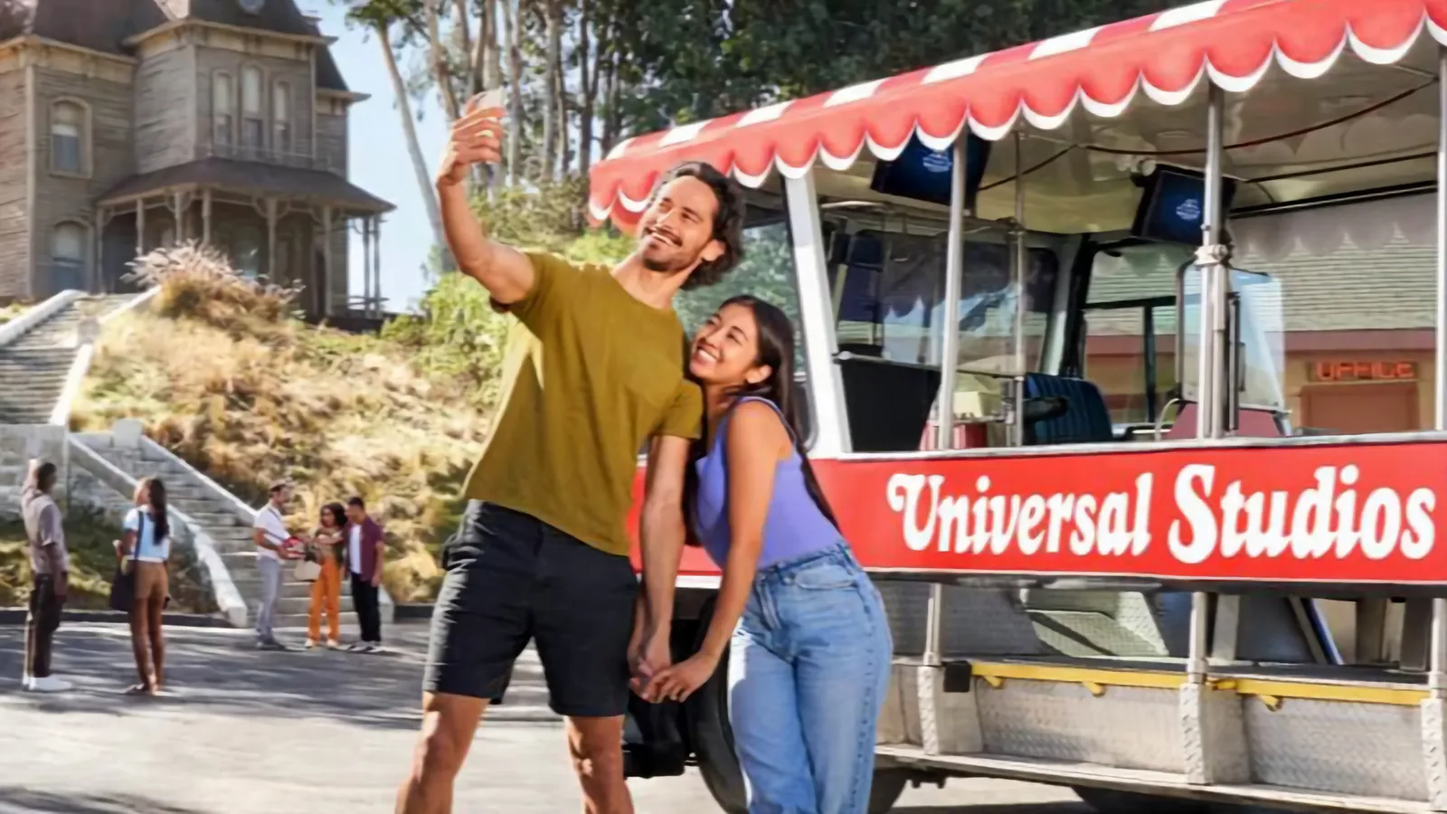 Couple photographing the Universal Studios entrance globe