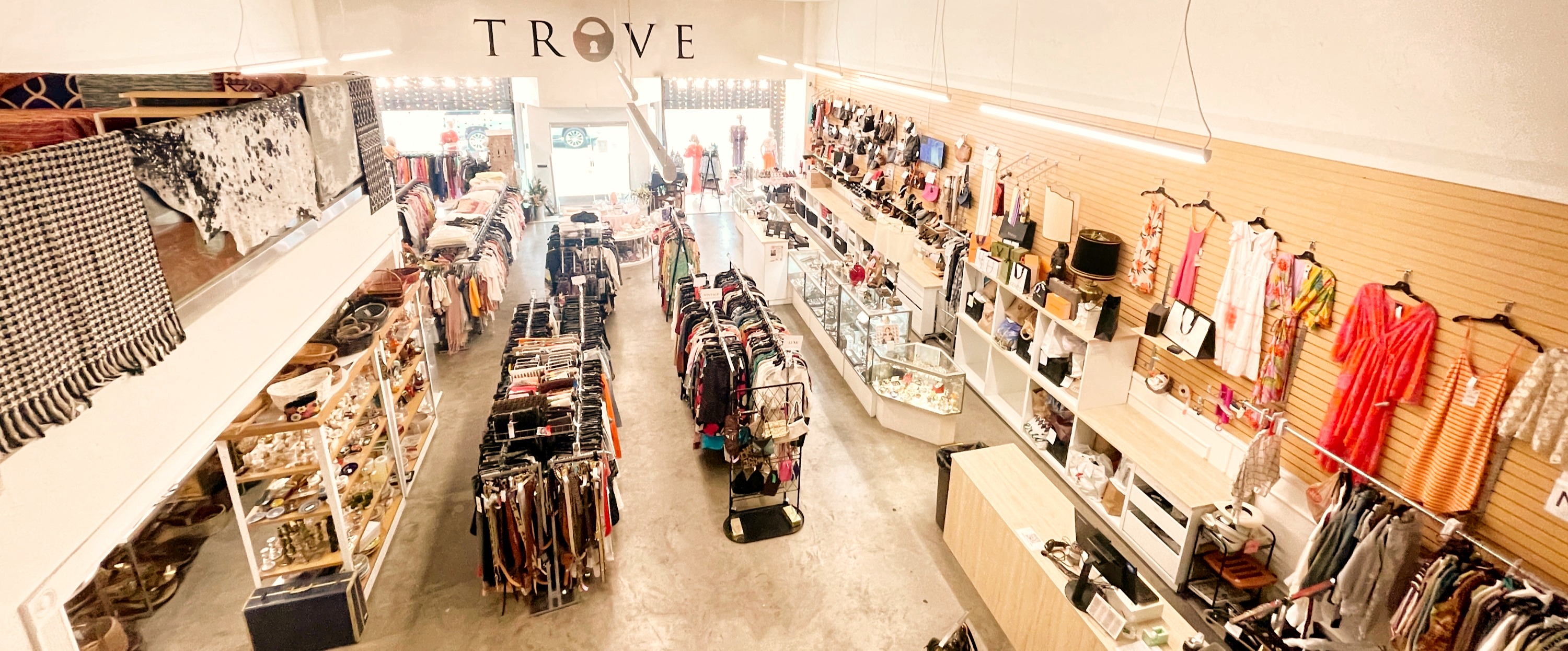 Racks of curated finds inside TROVE, Los Angeles