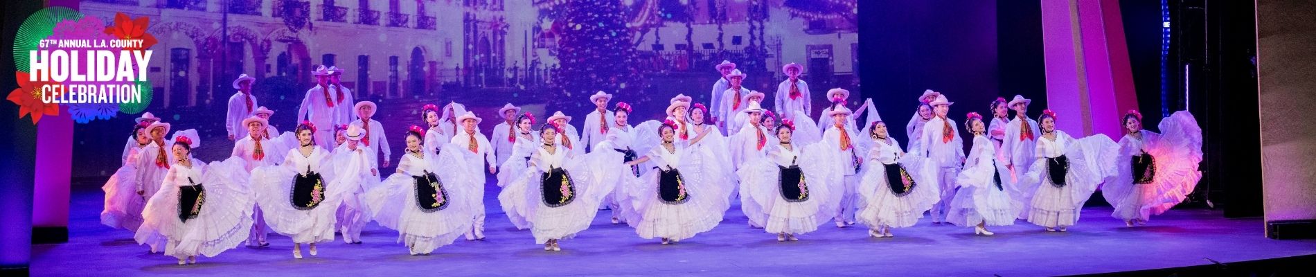 Performers take the Dorothy Chandler Pavilion stage at the L.A. County Holiday Celebration at The Music Center in downtown Los Angeles.