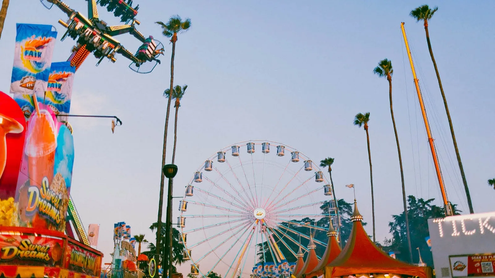 A lively fairground with colorful rides and attractions at 1101 W. McKinley Ave., Pomona, CA 91768