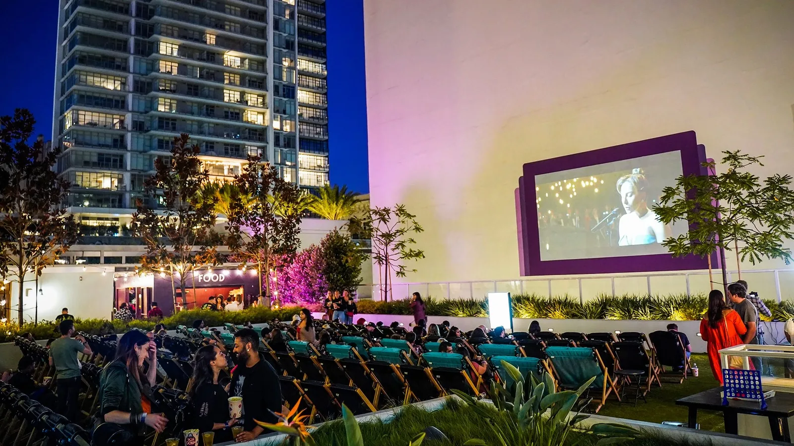 An outdoor rooftop movie theater in Downtown Los Angeles (888 S Olive St., 4th Floor, Los Angeles, CA) that screens curated films under the stars with skyline views.