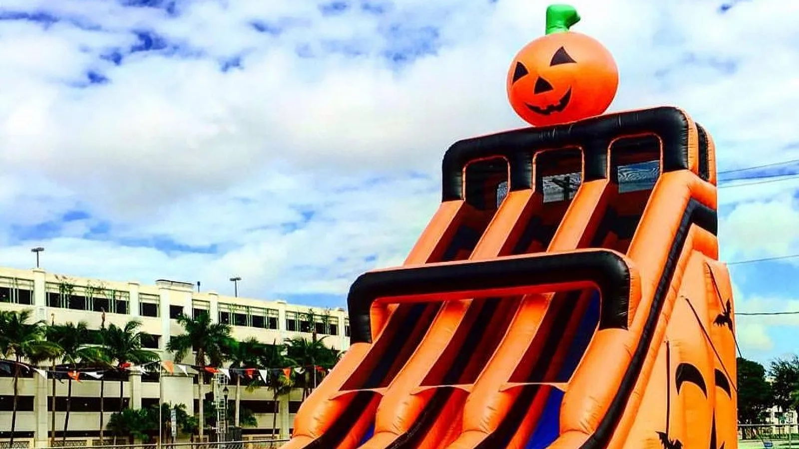 Large pumpkin slide at a Mr. Jack O' Lanterns Pumpkin Patch location.