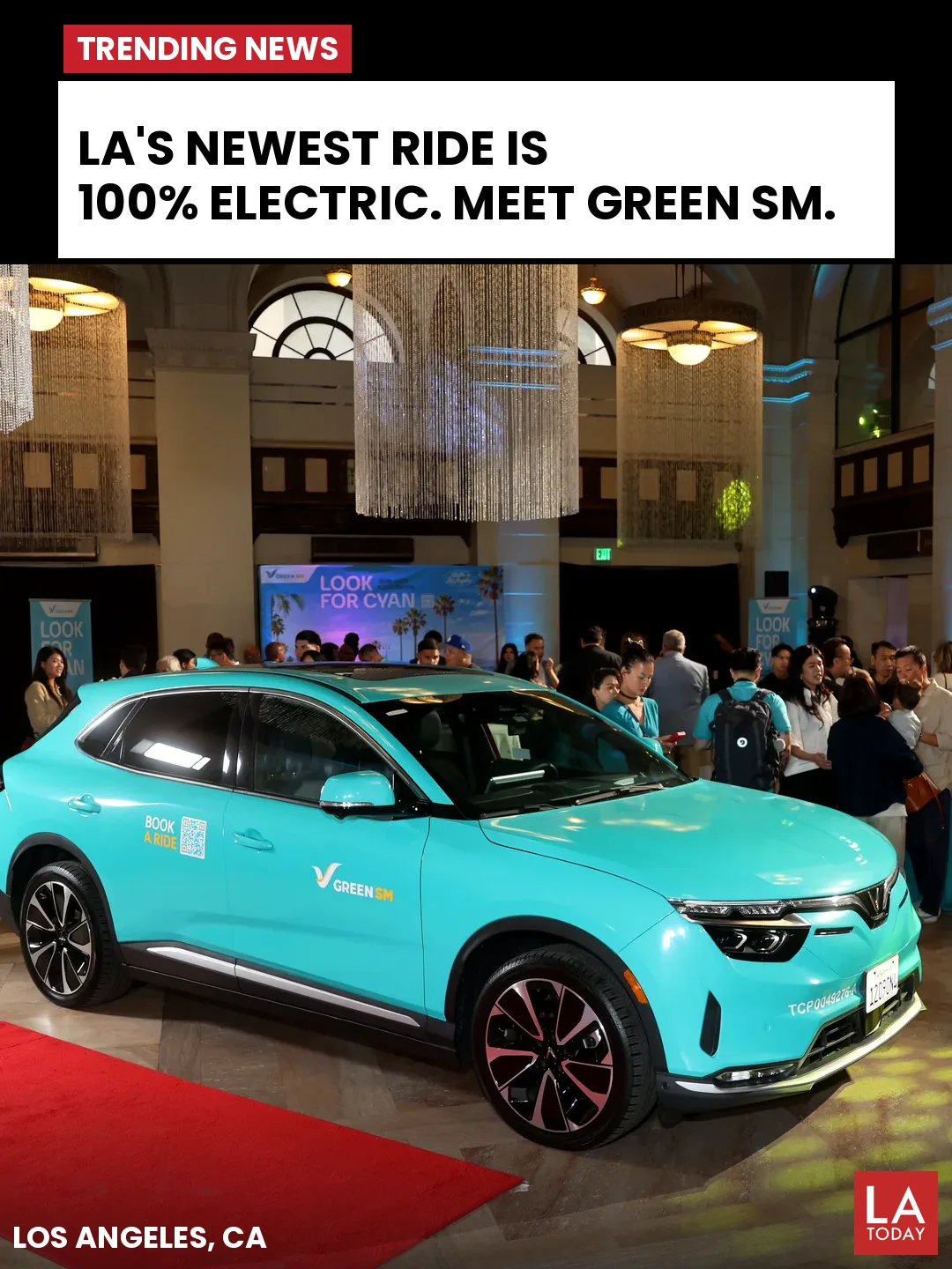 LA Today cover for Green SM: a cyan Green SM VinFast VF 8 beside a red carpet at the launch at The Majestic Downtown