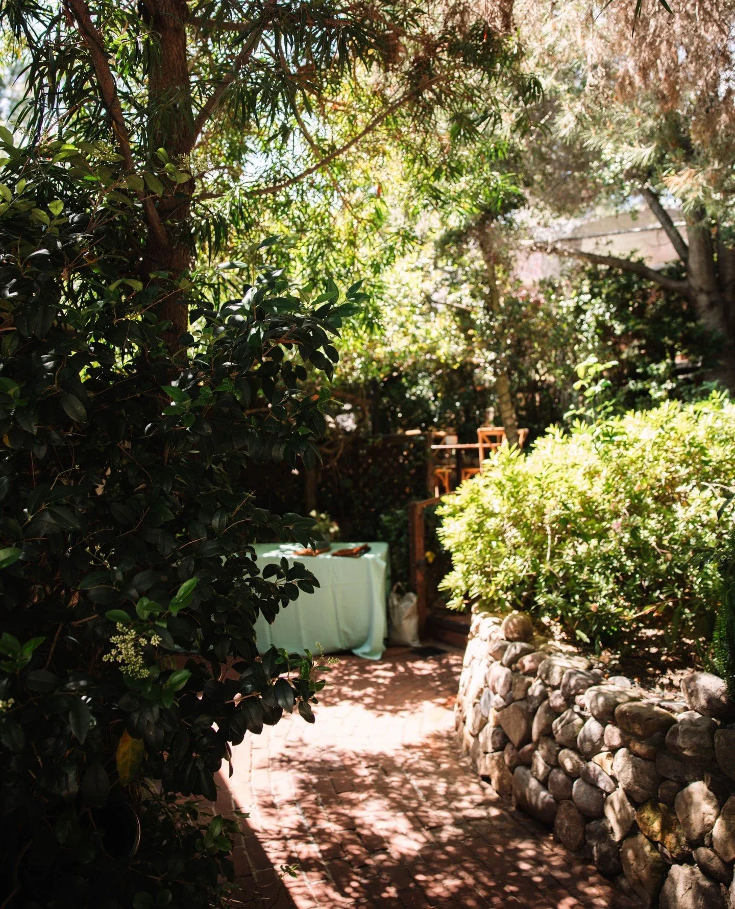 Candlelit creekside tables at Inn of the Seventh Ray, Topanga