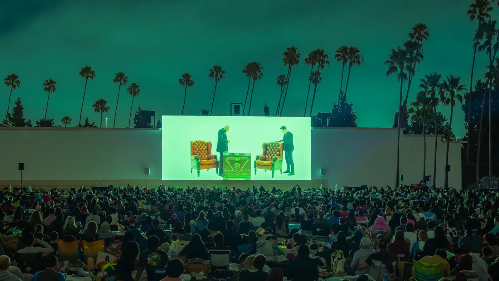 A Cinespia crowd on the lawn at Hollywood Forever Cemetery at night