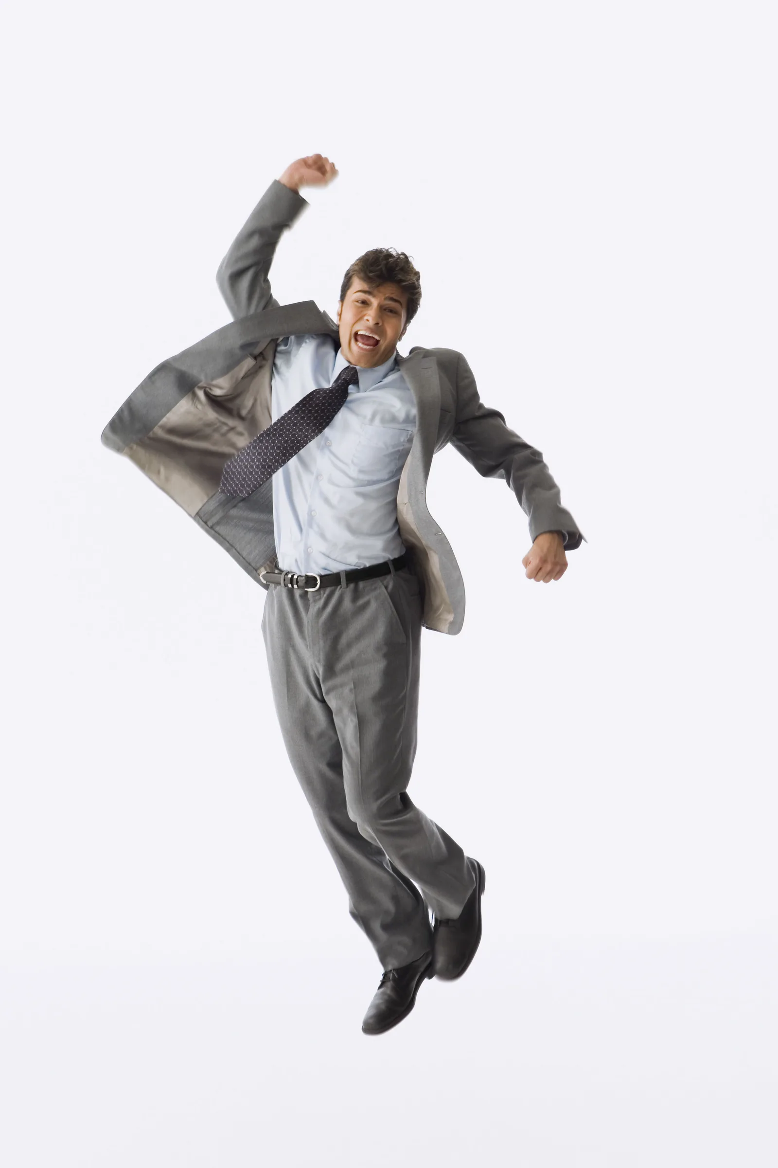 Zeeshan Naq photographed mid-jump against a plain background